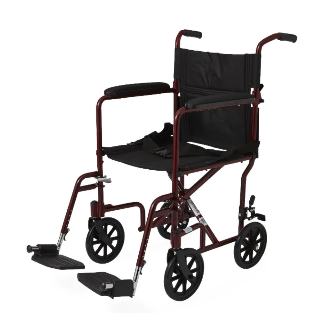 The Medline Basic Aluminum Transport Chair has a burgundy frame and black seat, with four wheels, two footrests, and padded fixed full-length armrests for easy mobility and assistance in transport.